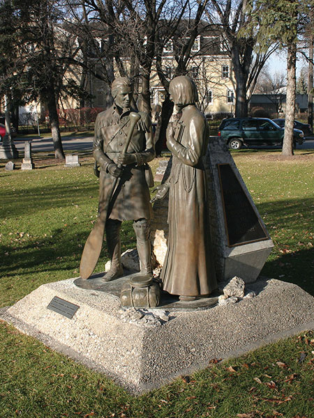 A monument in the St. Boniface Cathedral Cemetery on Tache Avenue, erected by La Société historique de Saint-Boniface, features sculptures of missionary Jean-Pierre Aulneau and Jean Baptiste Gaultier La Vérendryé, commemorating them and 19 others killed on an island in Lake of the Woods on 6 June 1736.