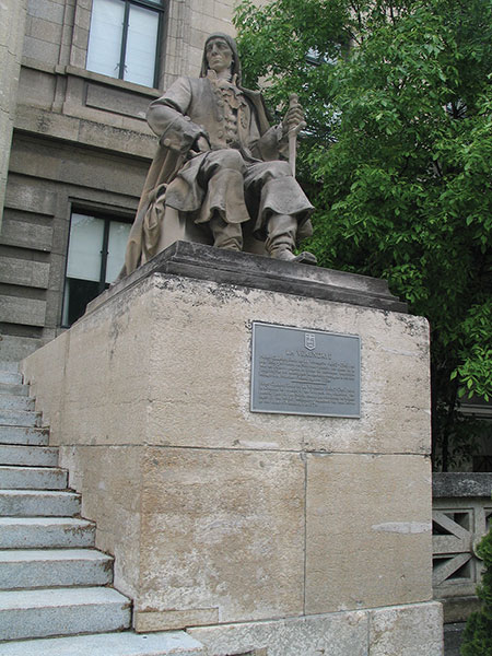 A statue of Pierre Gaultier De Varennes La Vérendrye guards the east entrance to the Manitoba Legislative Building.