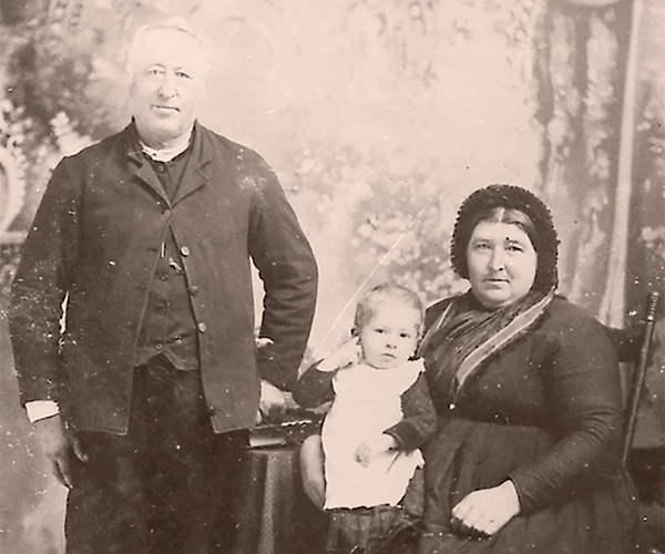 Pioneer midwife Katharina Hiebert (1855–1910) with husband Jacob Hiebert (1833–1906) and son Johann, circa 1896.