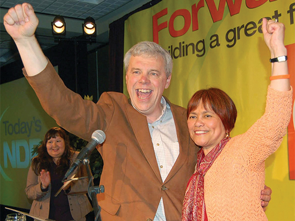 Newly elected MLA Flor Marcelino (right) celebrates with Manitoba Premier Greg Selinger at the Winnipeg Convention Centre, 22 May 2007.