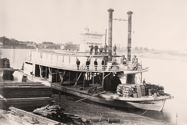 Wood was an essential resource for the steamboats that plied Manitoba waters from the 1850s to the early 20th century. In this view byWinnipeg photographer Israel Bennetto taken around 1883, the Marquette is standing at anchor, loaded with firewood to fuel its boilers.Built in 1881 for Peter MacArthur’s Northwest Navigation Company, the Marquette saw service on the Red and Assiniboine rivers.