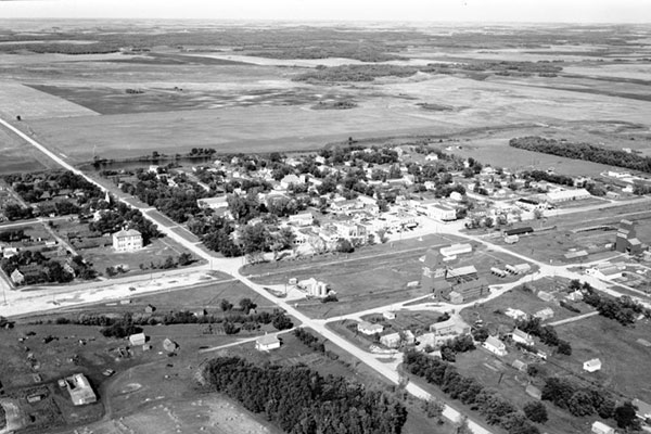 Aerial view of grain elevator at Baldur in foreground