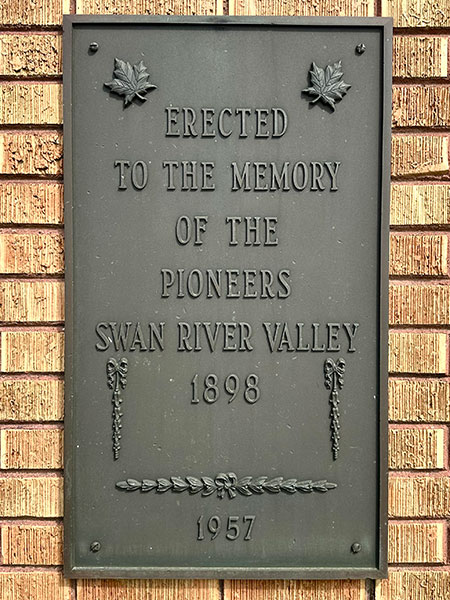 Pioneers commemorative plaque at entrance to Birchwood Cemetery