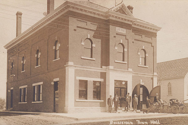 Postcard view of the Boissevain Town Hall, with St. Andrew’s Presbyterian Church at right