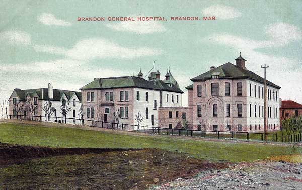 Postcard view of the Brandon General Hospital showing, from left to right, the nurses’ residence, hospital building, and surgical building