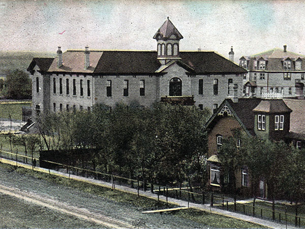 Postcard view of the Portage Central School with the former Lansdowne College building in the background