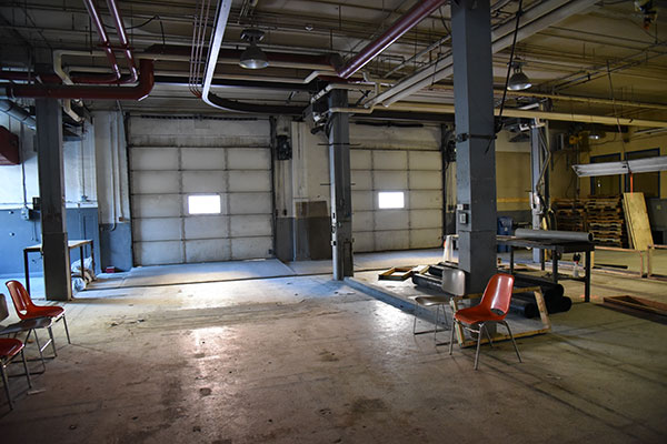 Former appliance showroom converted to vehicle maintenance garage