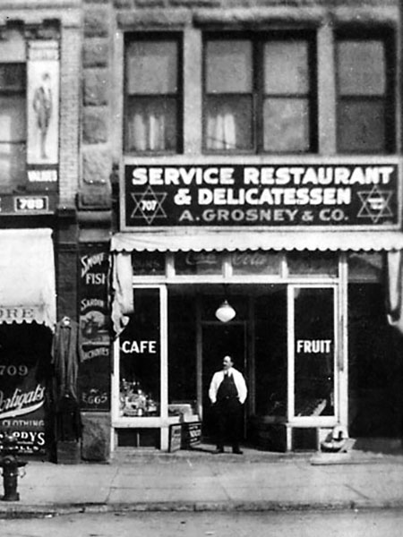 Storefront of A. Grosney restaurant and delicatessen in the Cleland Block