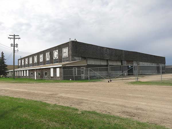 Former Commonwealth Air Training Plan hangar at Dauphin Municipal Airport, later used for storage and deconstructed in 2023