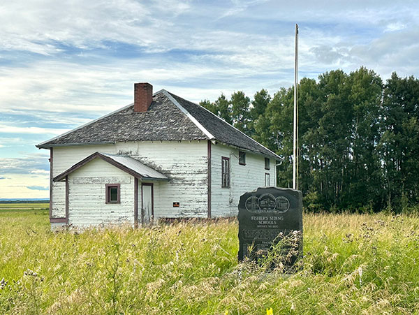 The former Fishers Siding School and commemorative monument