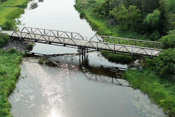 Steel pony truss bridge over the Fishing River