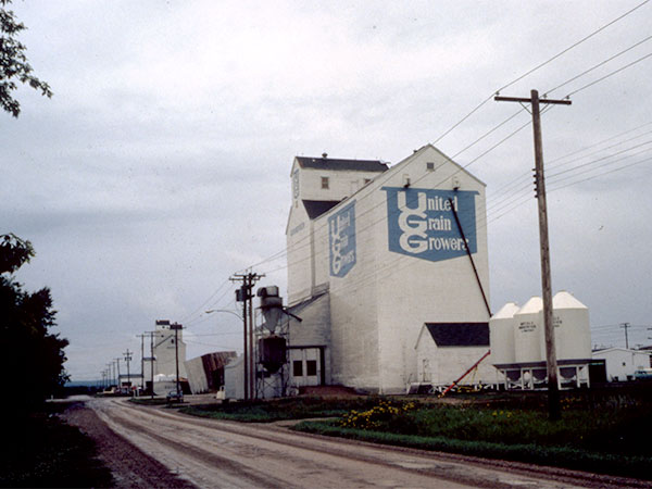 United Grain Growers grain elevator at Grandview, with the Manitoba Pool grain elevator in the background
