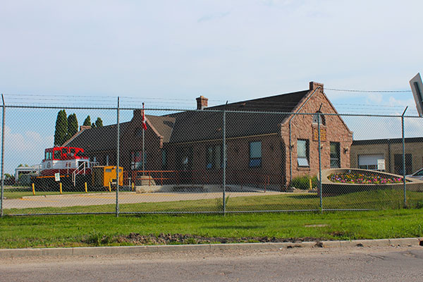 Aerial view of Greater Winnipeg Water District Station and Railway Car