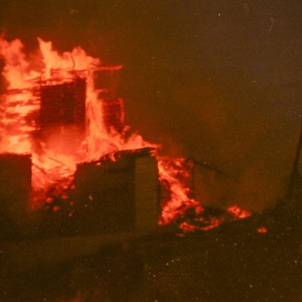 The former Federal Grain elevator being destroyed by fire