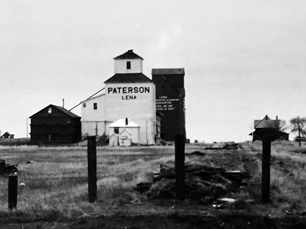 Paterson grain elevator at Lena with the Manitoba Pool grain elevator behind it