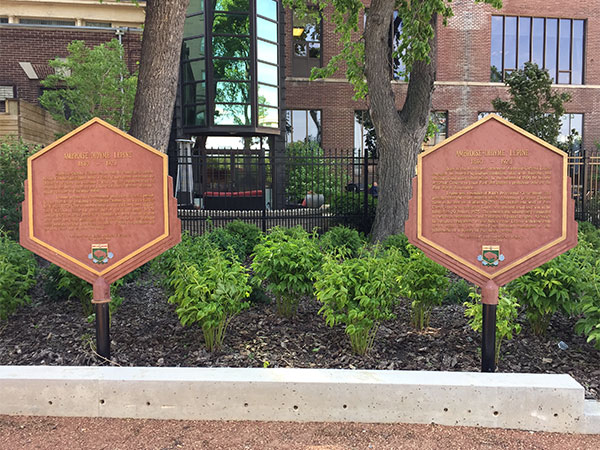 Ambroise-Didyme Lépine plaques with the Manitoba Club in the background
