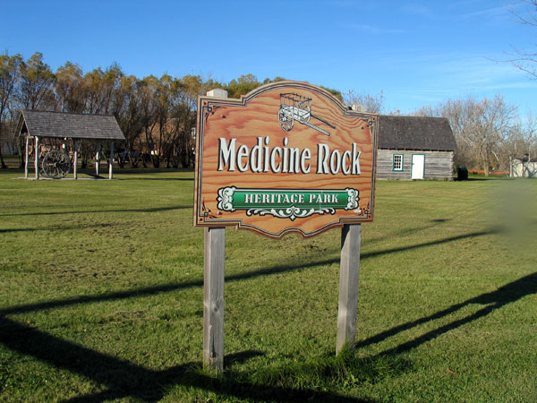 Medicine Rock Heritage Park features a Red River Cart and the log house of Pascal Breland