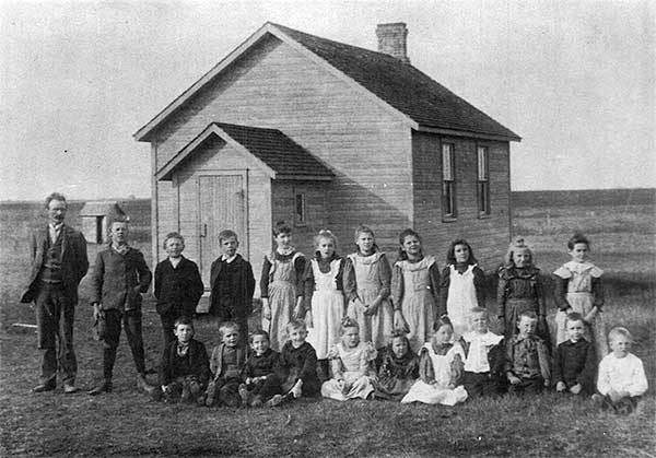 Teacher James Tod and students at Rose School
