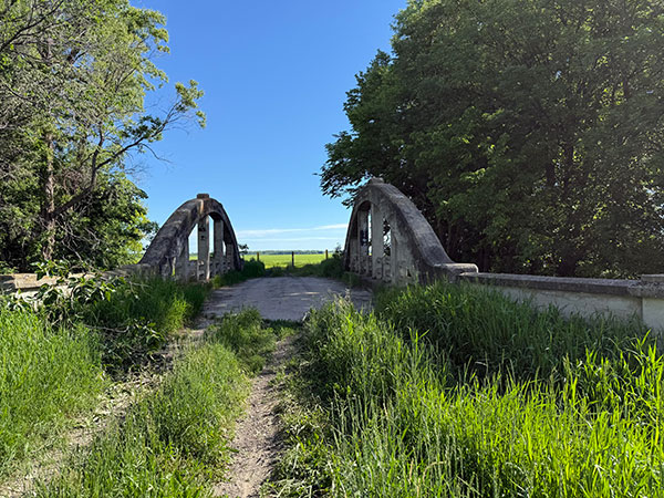 Concrete bowstring arch bridge no. 374 over the Mill Creek
