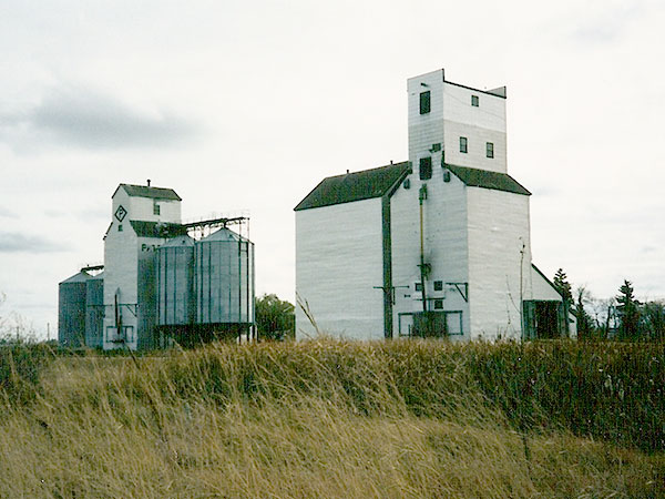 Former Manitoba Pool grain elevator at Minto with the former Paterson grain elevator at the left background