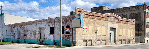 Former Canadian Moline Plow Building reduced to a single storey
