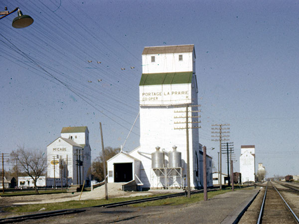 McCabe grain elevator at Portage la Prairie at left with Manitoba Pool B in centre, and Manitoba Pool A and United Grain Growers 1 at right