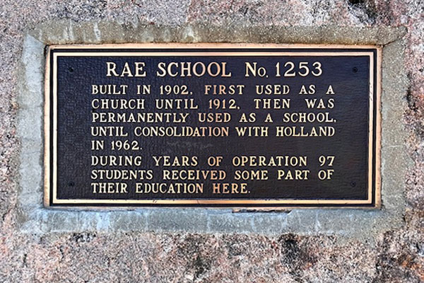 Plaque on the Rae School commemorative monument