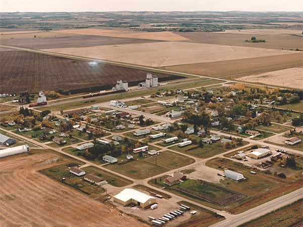 Aerial view of the grain elevators at Rathwell, with UGG 2 at left, UGG 1 in middle, and Manitoba Pool at right