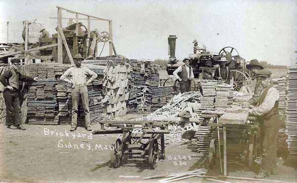 A postcard view of workers at the Sidney Brickworks, taken by photographer Edward Bates