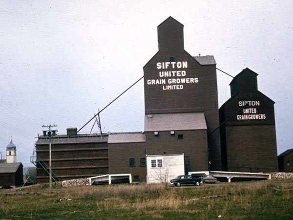 United Grain Growers grain elevators at Sifton, with the older elevator at right and the newer elevator to its left