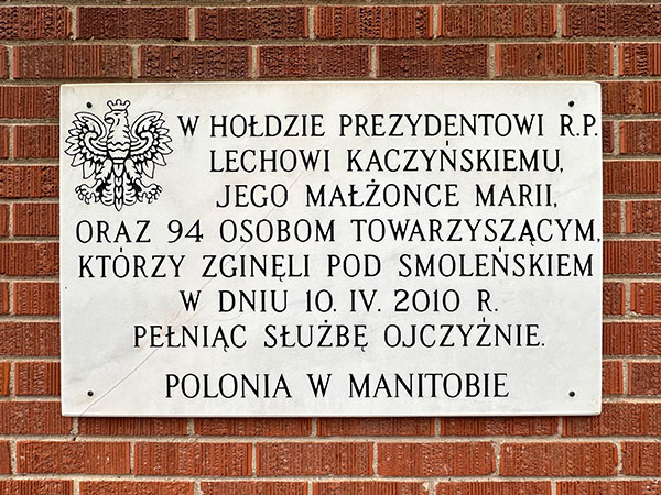 Plaque commemorating the death of Polish President Lech Kaczynski on the exterior of St. Andrew Bobola Roman Catholic Church
