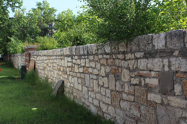 Stone fence on the east side
