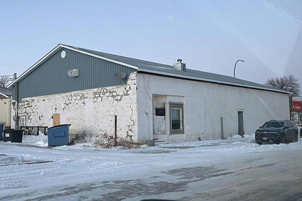 Rear of Happy Chopsticks Restaurant showing fieldstone construction