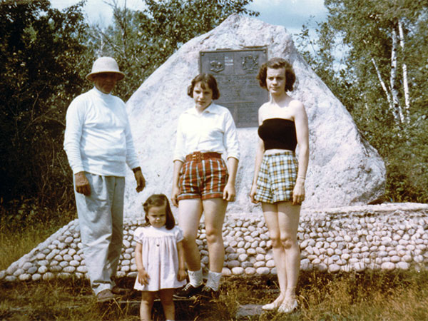 A family at the Trans-Canada Highway monument