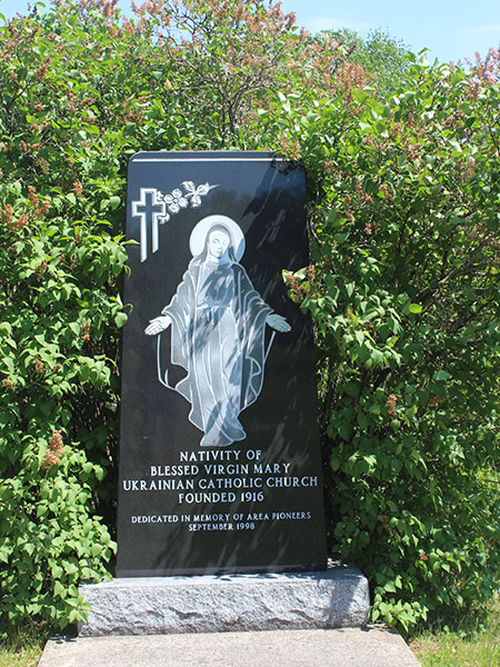 Commemorative monument for local pioneers at the Nativity of the Blessed Virgin Mary Ukrainian Catholic Church