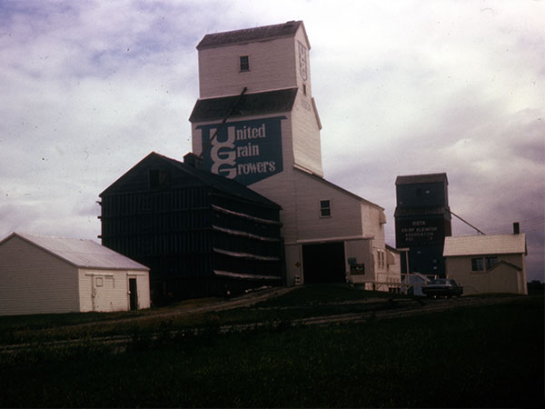 United Grain Growers No. 1 grain elevator and annex at Vista with the Manitoba Pool grain elevator in the background