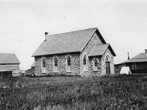 A view of Whitewater Presbyterian Church, with its associated stable at left and manse at right, taken by Rev. Alexander Tainsh Macintosh